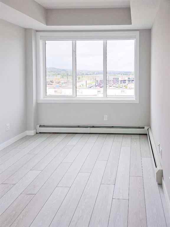 MLS® A2244913 - Unit #2413 111 Wolf Creek Drive SE in Wolf Willow Calgary, Residential