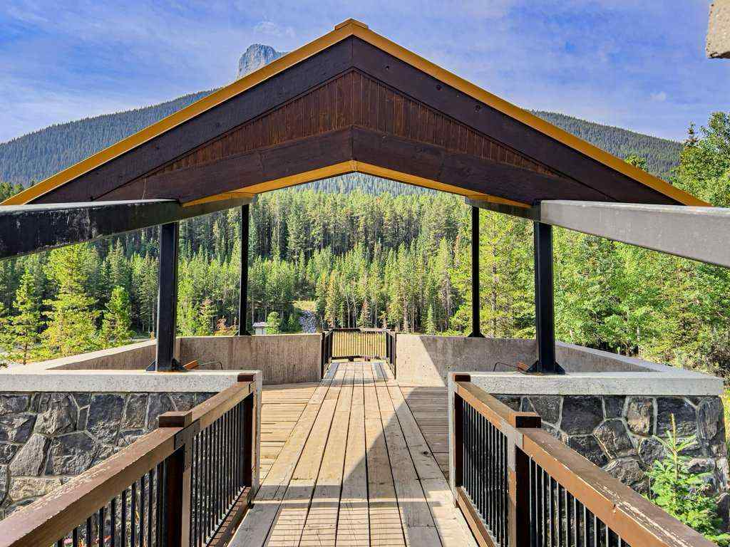 MLS® A2244914 - Unit #205 106 Stewart Creek Landing  in Three Sisters Canmore, Residential