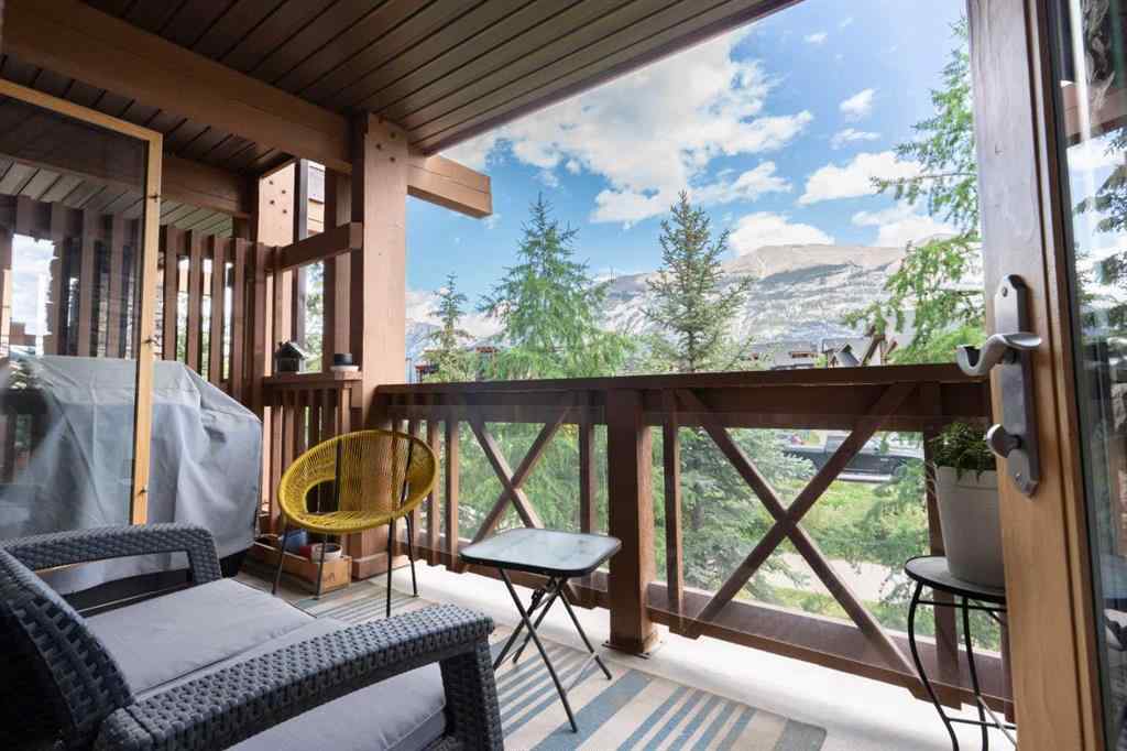 MLS® A2244914 - Unit #205 106 Stewart Creek Landing  in Three Sisters Canmore, Residential