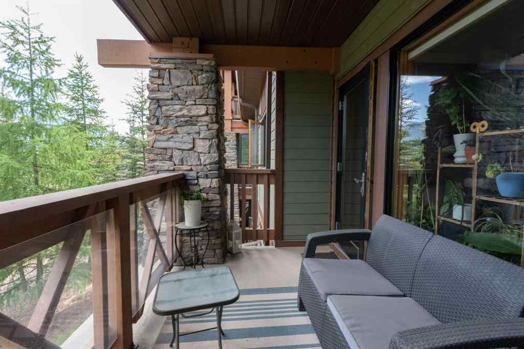 MLS® A2244914 - Unit #205 106 Stewart Creek Landing  in Three Sisters Canmore, Residential