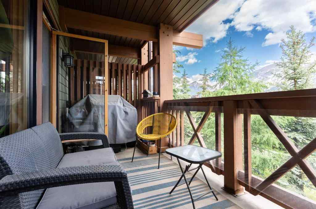 MLS® A2244914 - Unit #205 106 Stewart Creek Landing  in Three Sisters Canmore, Residential