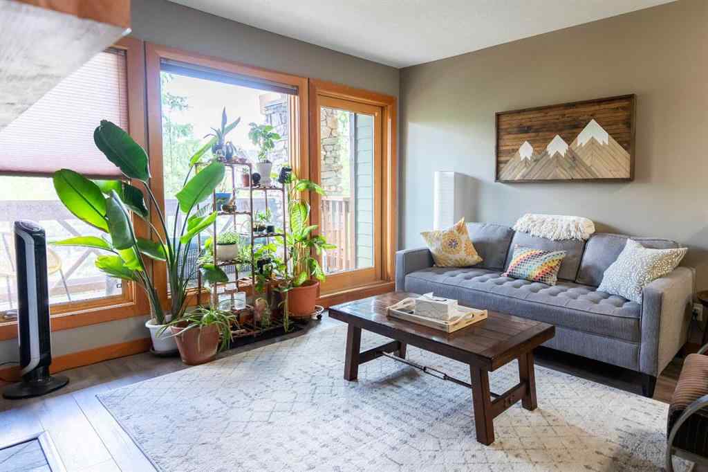 MLS® A2244914 - Unit #205 106 Stewart Creek Landing  in Three Sisters Canmore, Residential