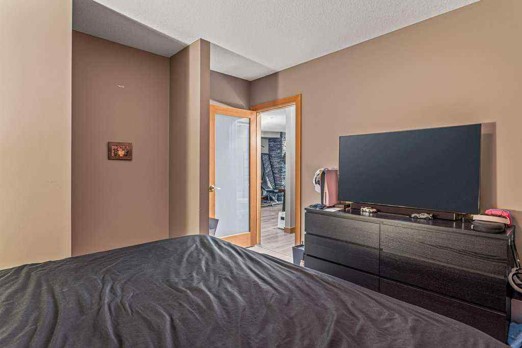 MLS® A2244914 - Unit #205 106 Stewart Creek Landing  in Three Sisters Canmore, Residential