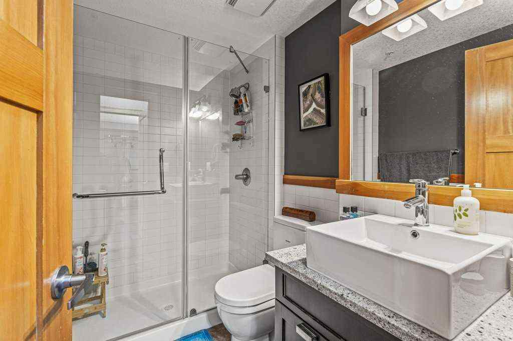 MLS® A2244914 - Unit #205 106 Stewart Creek Landing  in Three Sisters Canmore, Residential
