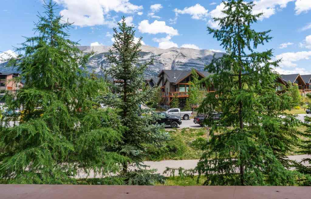 MLS® A2244914 - Unit #205 106 Stewart Creek Landing  in Three Sisters Canmore, Residential