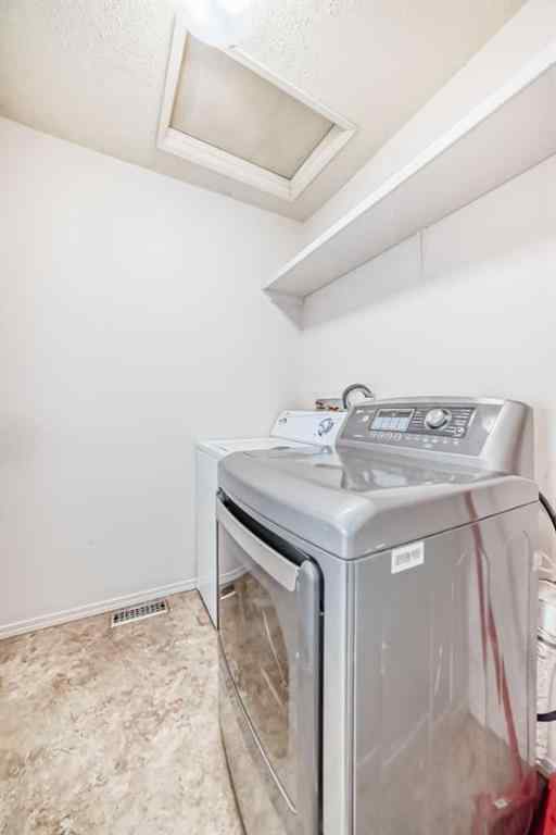 MLS® A2244959 - 7411 20A Street SE in Ogden Calgary, Multi-Family