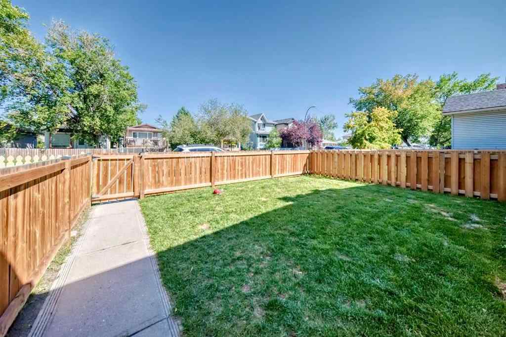 MLS® A2244959 - 7411 20A Street SE in Ogden Calgary, Multi-Family
