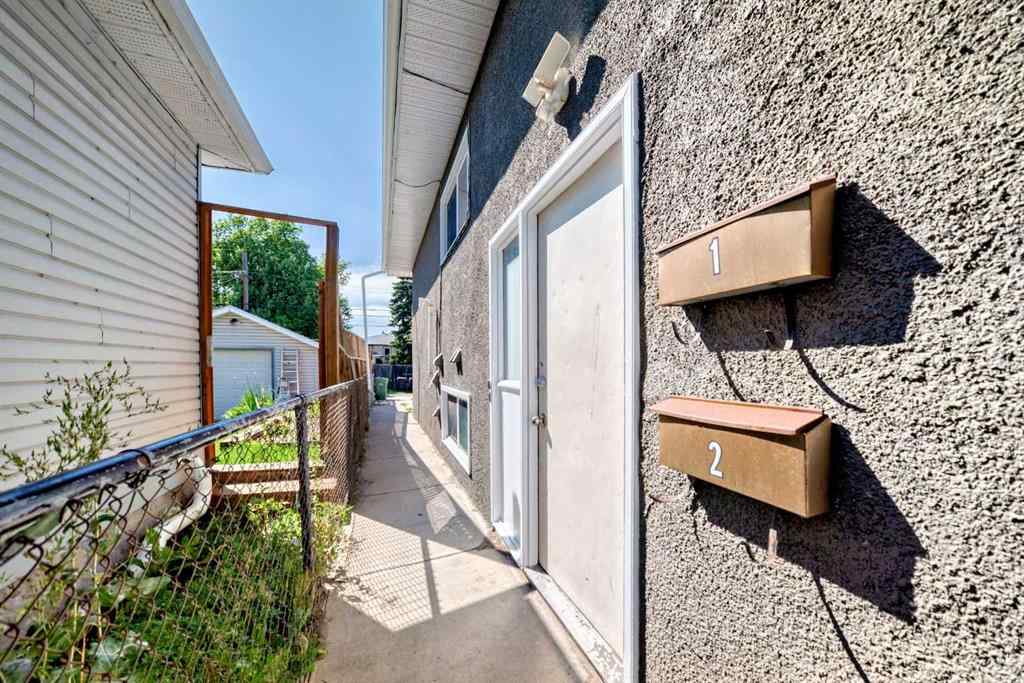 MLS® A2244959 - 7411 20A Street SE in Ogden Calgary, Multi-Family