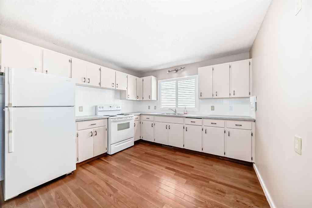 MLS® A2244959 - 7411 20A Street SE in Ogden Calgary, Multi-Family