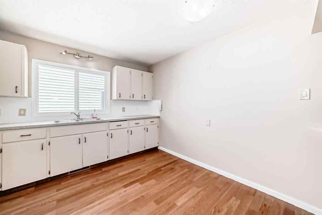 MLS® A2244959 - 7411 20A Street SE in Ogden Calgary, Multi-Family