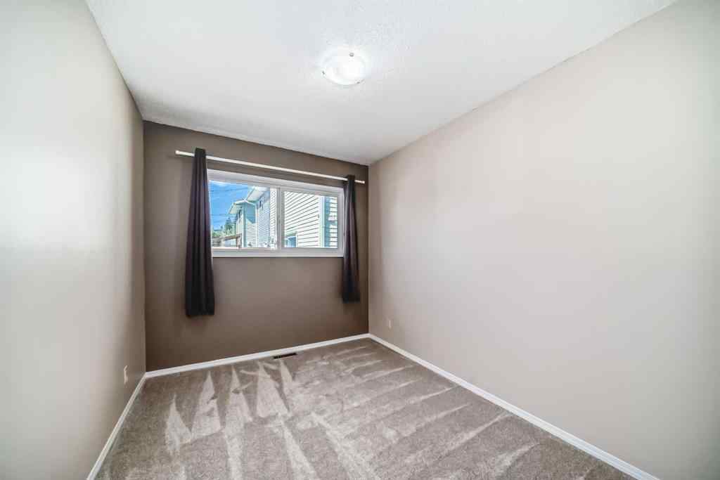 MLS® A2244959 - 7411 20A Street SE in Ogden Calgary, Multi-Family