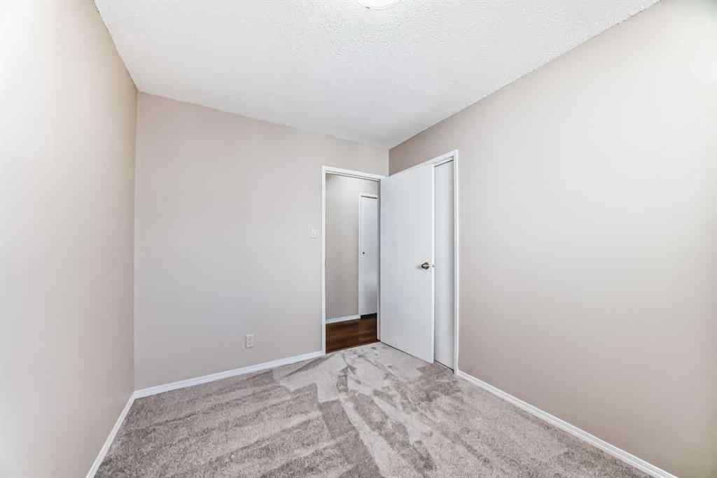 MLS® A2244959 - 7411 20A Street SE in Ogden Calgary, Multi-Family