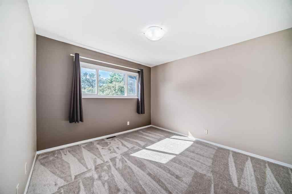 MLS® A2244959 - 7411 20A Street SE in Ogden Calgary, Multi-Family