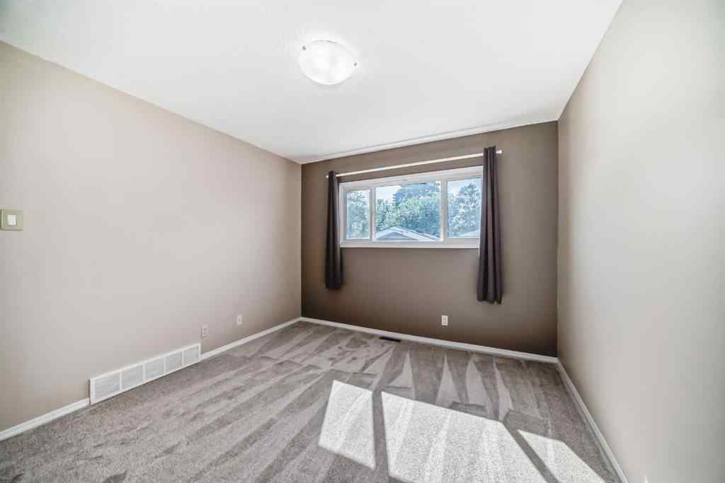 MLS® A2244959 - 7411 20A Street SE in Ogden Calgary, Multi-Family