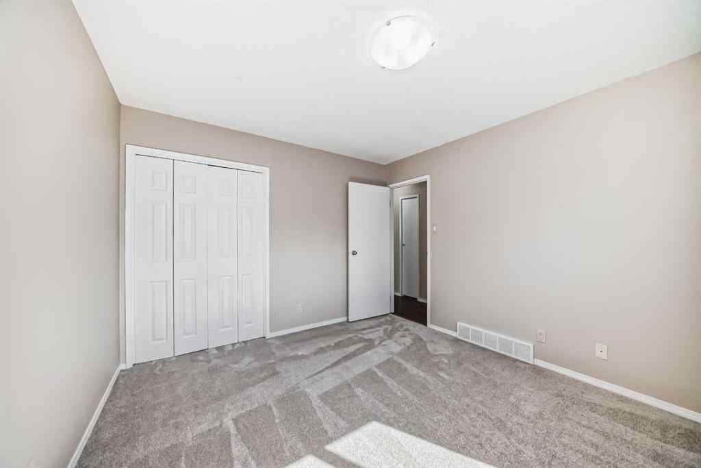 MLS® A2244959 - 7411 20A Street SE in Ogden Calgary, Multi-Family