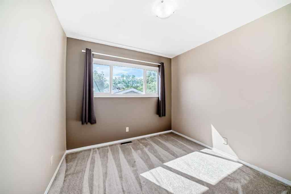 MLS® A2244959 - 7411 20A Street SE in Ogden Calgary, Multi-Family