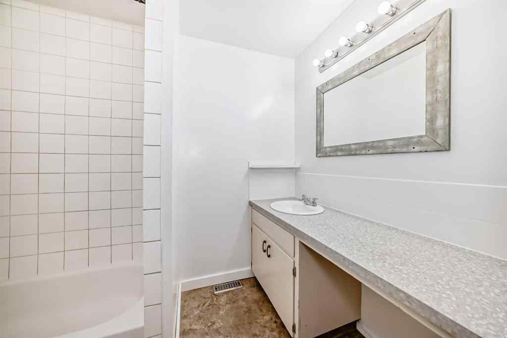 MLS® A2244959 - 7411 20A Street SE in Ogden Calgary, Multi-Family