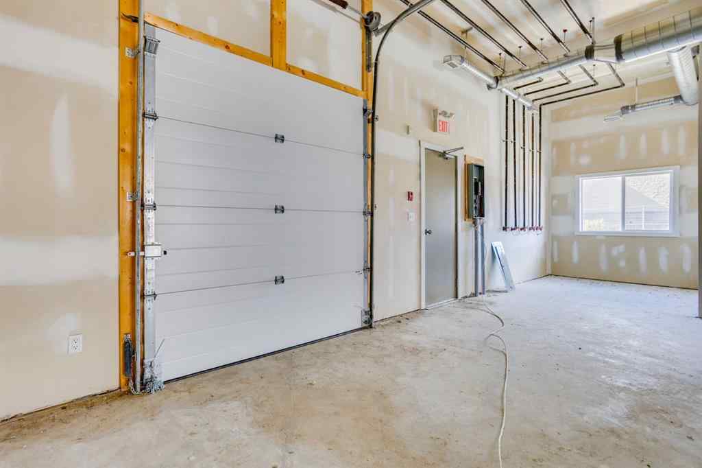 MLS® A2244964 - Unit #104 234 Stony Mountain Road   in Anzac Business Park Anzac, Commercial