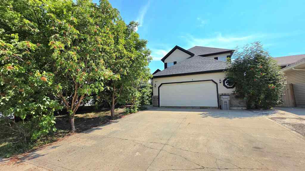 MLS® A2244966 - 9857 66 Avenue  in Country Club West Grande Prairie, Residential