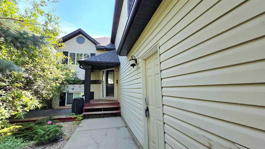 MLS® A2244966 - 9857 66 Avenue  in Country Club West Grande Prairie, Residential