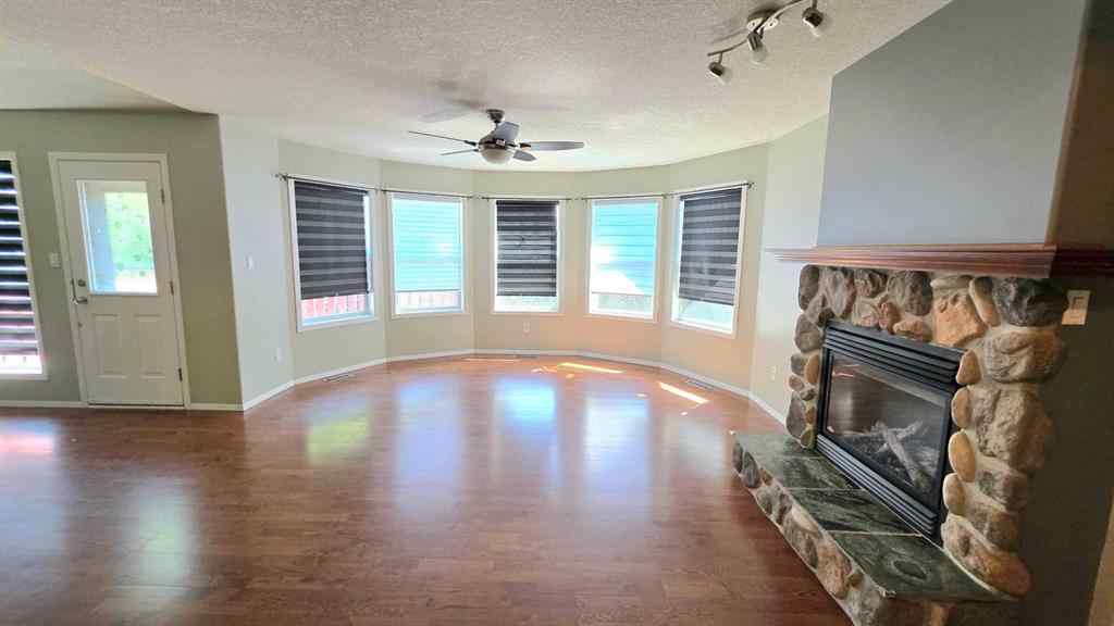 MLS® A2244966 - 9857 66 Avenue  in Country Club West Grande Prairie, Residential