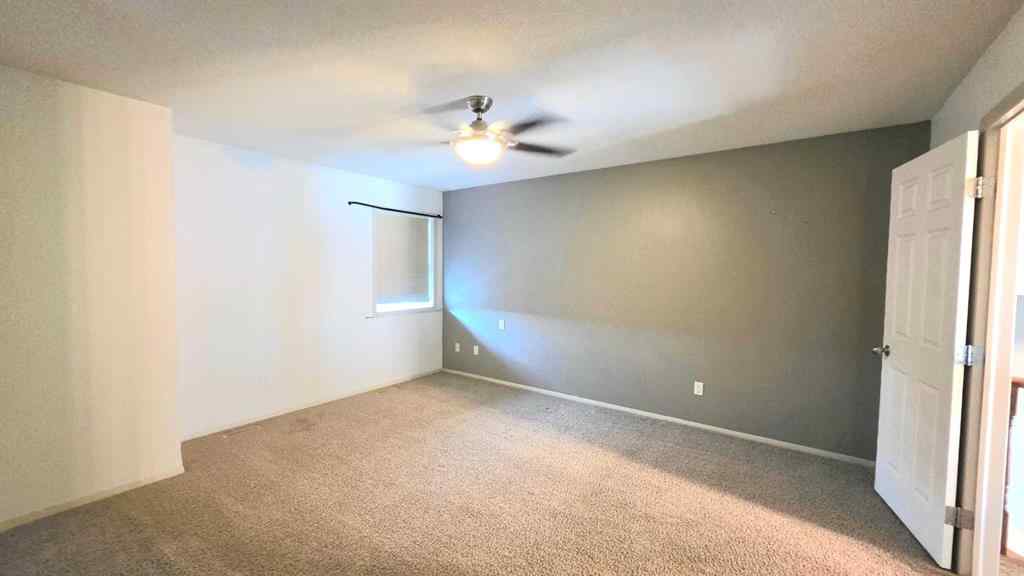 MLS® A2244966 - 9857 66 Avenue  in Country Club West Grande Prairie, Residential