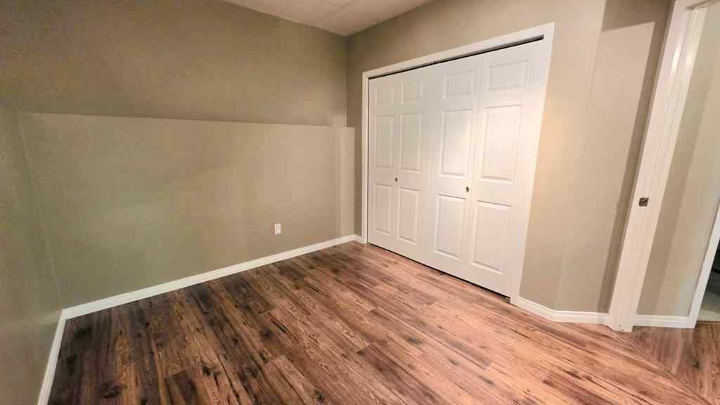 MLS® A2244966 - 9857 66 Avenue  in Country Club West Grande Prairie, Residential