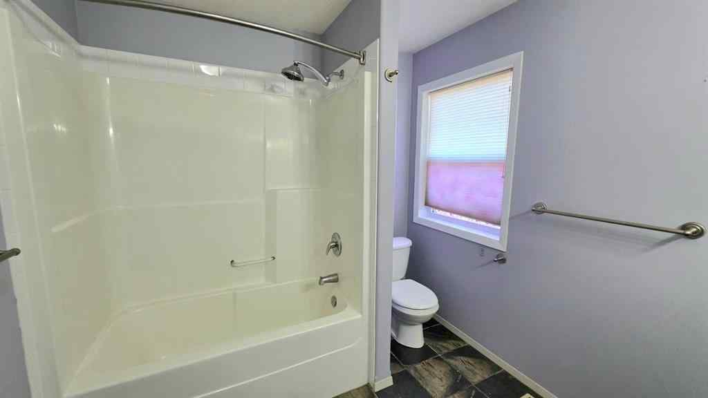 MLS® A2244966 - 9857 66 Avenue  in Country Club West Grande Prairie, Residential