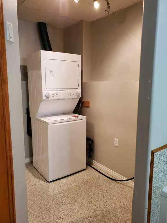 MLS® A2244966 - 9857 66 Avenue  in Country Club West Grande Prairie, Residential