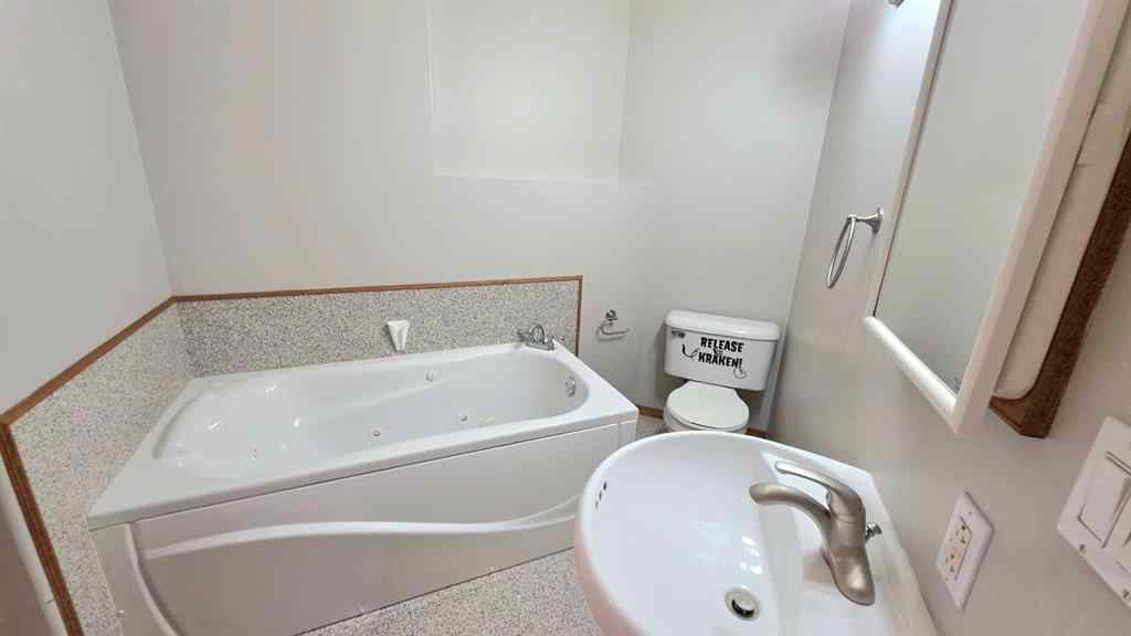 MLS® A2244966 - 9857 66 Avenue  in Country Club West Grande Prairie, Residential