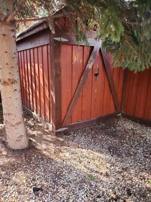 MLS® A2244966 - 9857 66 Avenue  in Country Club West Grande Prairie, Residential