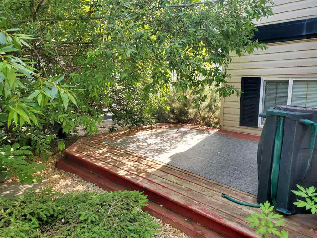 MLS® A2244966 - 9857 66 Avenue  in Country Club West Grande Prairie, Residential