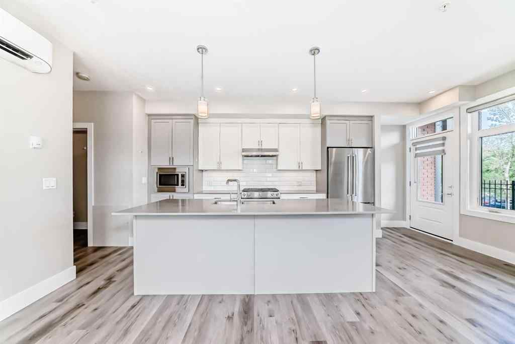 MLS® A2244995 - Unit #115 1702 17 Avenue SW in Scarboro Calgary, Residential