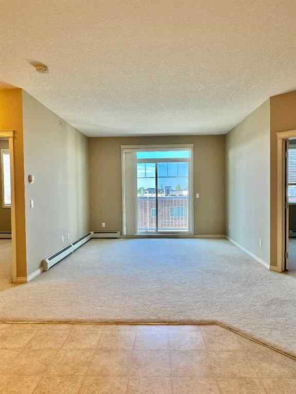 MLS® A2244996 - Unit #408 102 Cranberry Park SE in Cranston Calgary, Residential