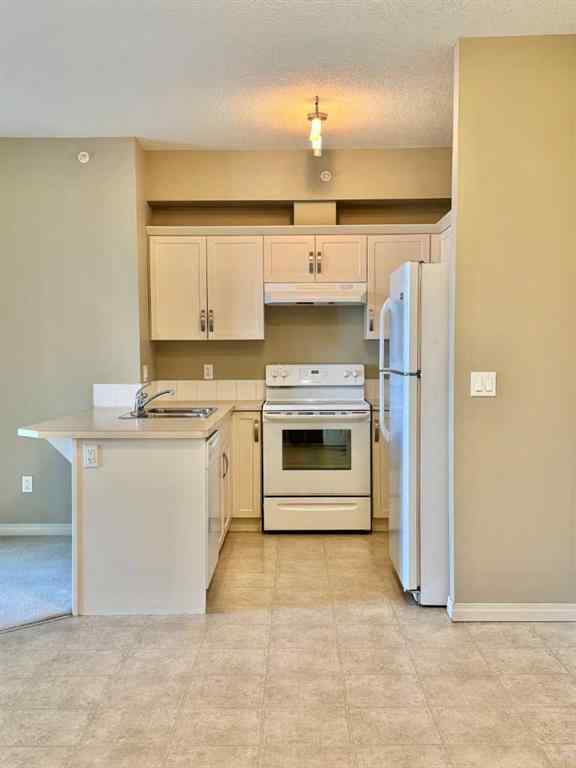 MLS® A2244996 - Unit #408 102 Cranberry Park SE in Cranston Calgary, Residential