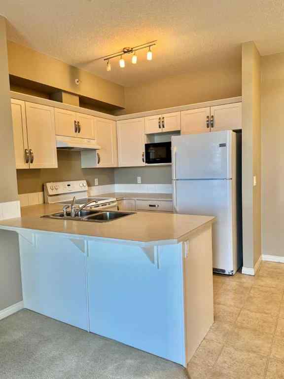 MLS® A2244996 - Unit #408 102 Cranberry Park SE in Cranston Calgary, Residential