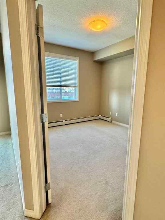 MLS® A2244996 - Unit #408 102 Cranberry Park SE in Cranston Calgary, Residential