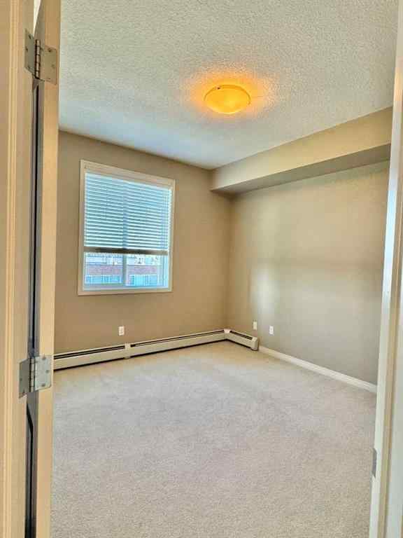MLS® A2244996 - Unit #408 102 Cranberry Park SE in Cranston Calgary, Residential