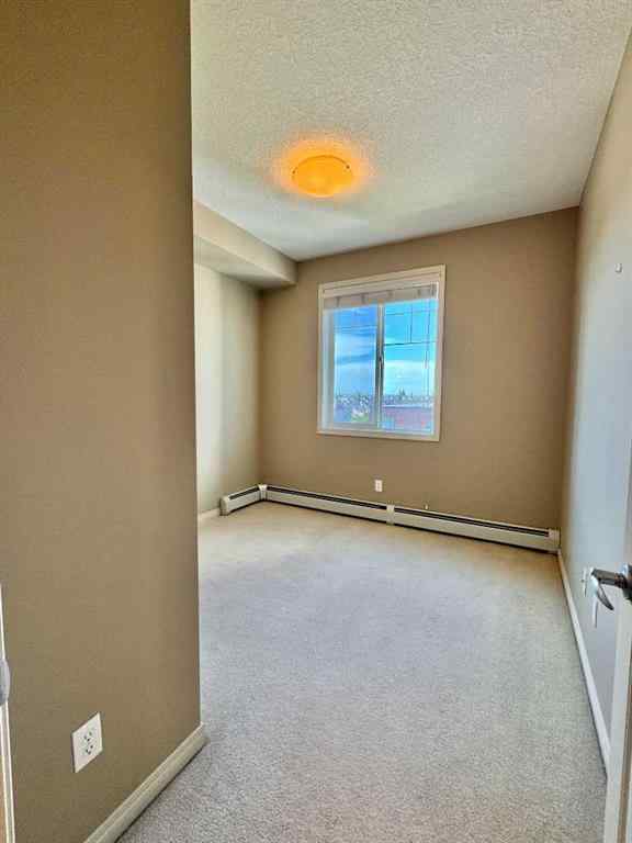 MLS® A2244996 - Unit #408 102 Cranberry Park SE in Cranston Calgary, Residential