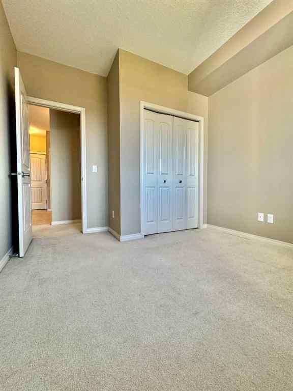 MLS® A2244996 - Unit #408 102 Cranberry Park SE in Cranston Calgary, Residential