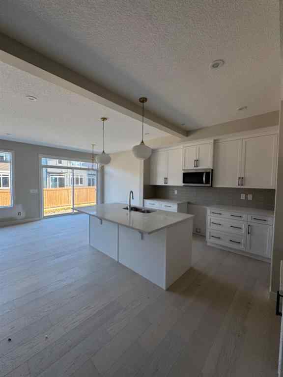 MLS® A2244997 - 99 Waterford Manor  in Waterford Chestermere, Residential