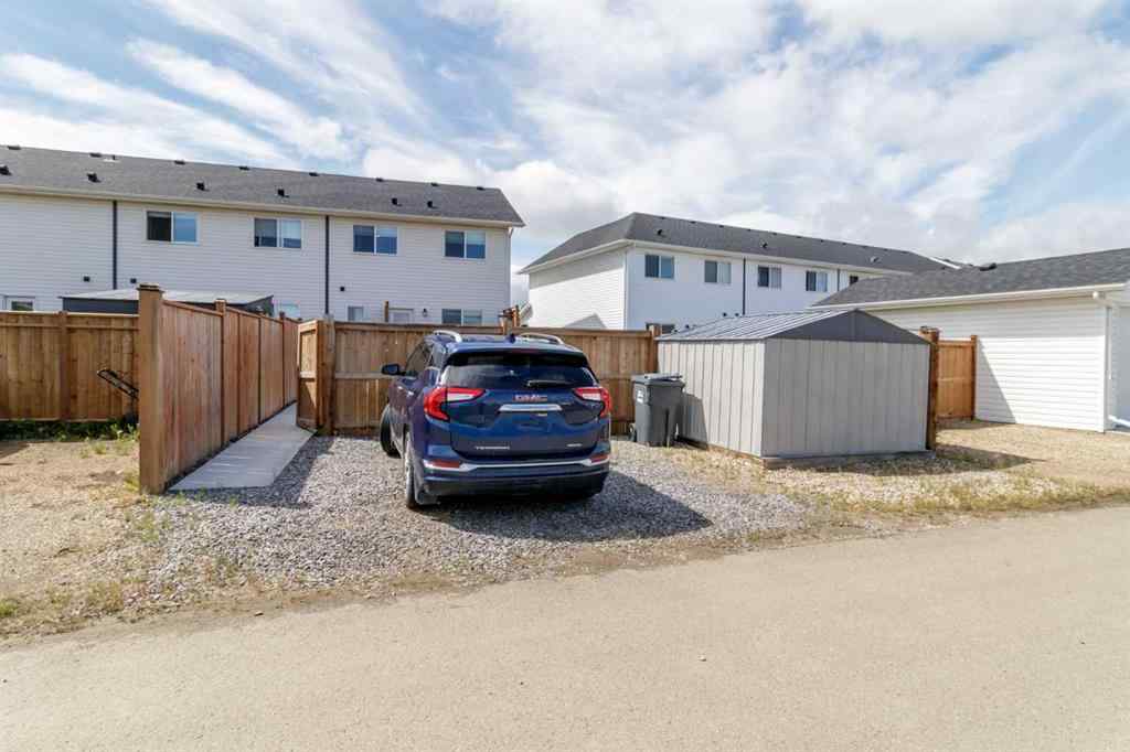 MLS® A2245025 - 104 Memorial Parkway  in Liberty Landing Rural Red Deer County, Residential