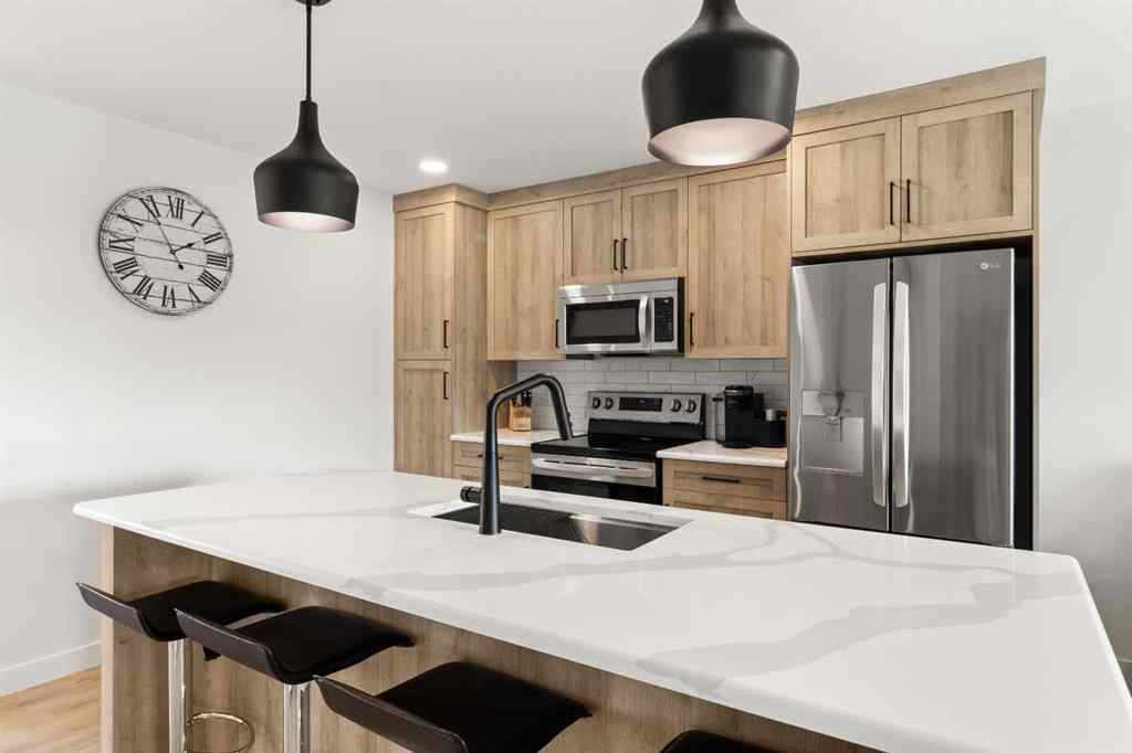 MLS® A2245025 - 104 Memorial Parkway  in Liberty Landing Rural Red Deer County, Residential