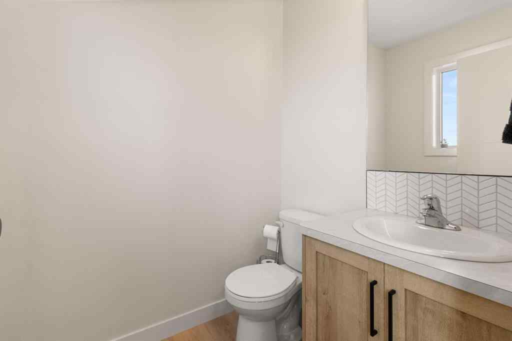 MLS® A2245025 - 104 Memorial Parkway  in Liberty Landing Rural Red Deer County, Residential