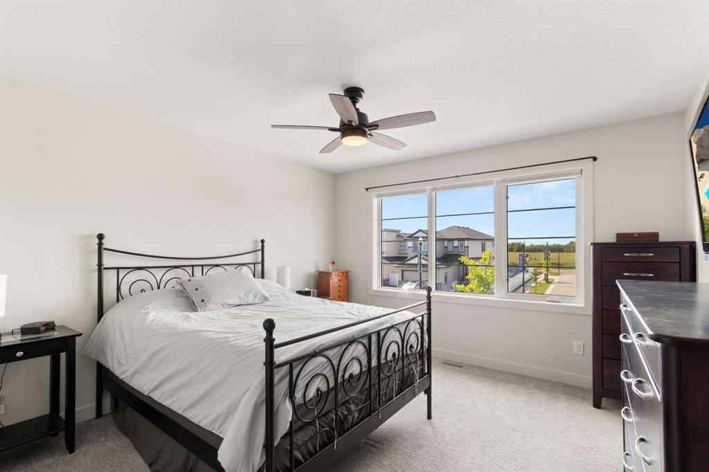 MLS® A2245025 - 104 Memorial Parkway  in Liberty Landing Rural Red Deer County, Residential