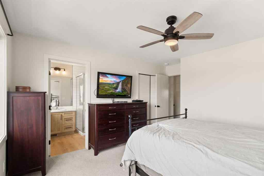 MLS® A2245025 - 104 Memorial Parkway  in Liberty Landing Rural Red Deer County, Residential