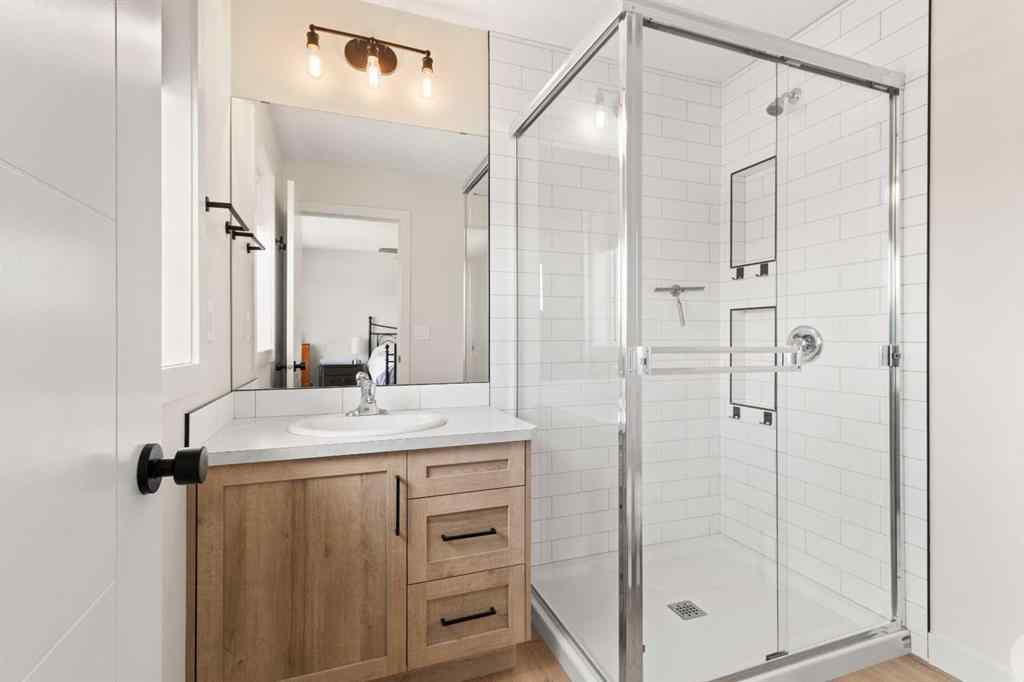 MLS® A2245025 - 104 Memorial Parkway  in Liberty Landing Rural Red Deer County, Residential