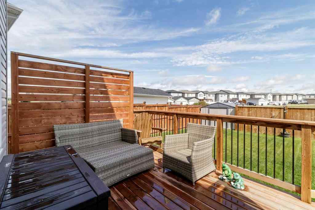 MLS® A2245025 - 104 Memorial Parkway  in Liberty Landing Rural Red Deer County, Residential