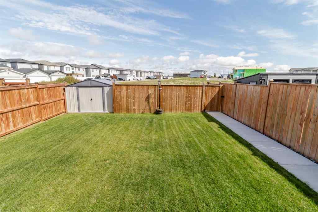 MLS® A2245025 - 104 Memorial Parkway  in Liberty Landing Rural Red Deer County, Residential