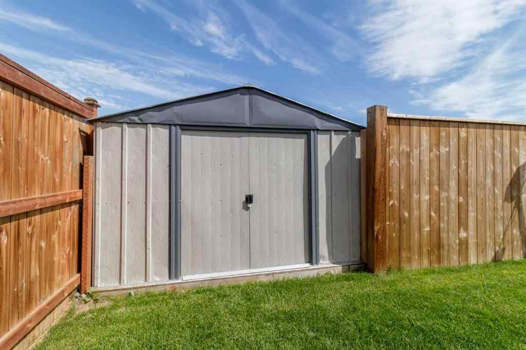 MLS® A2245025 - 104 Memorial Parkway  in Liberty Landing Rural Red Deer County, Residential